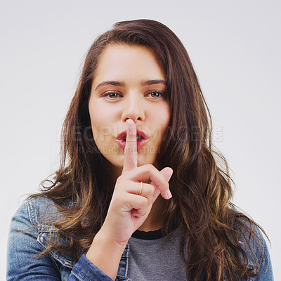 Buy stock photo Woman, portrait and finger with rumor, studio and silence for mystery announcement. Model, gossip and hush with secret, whisper and gesture for news or noise with confidential on white background