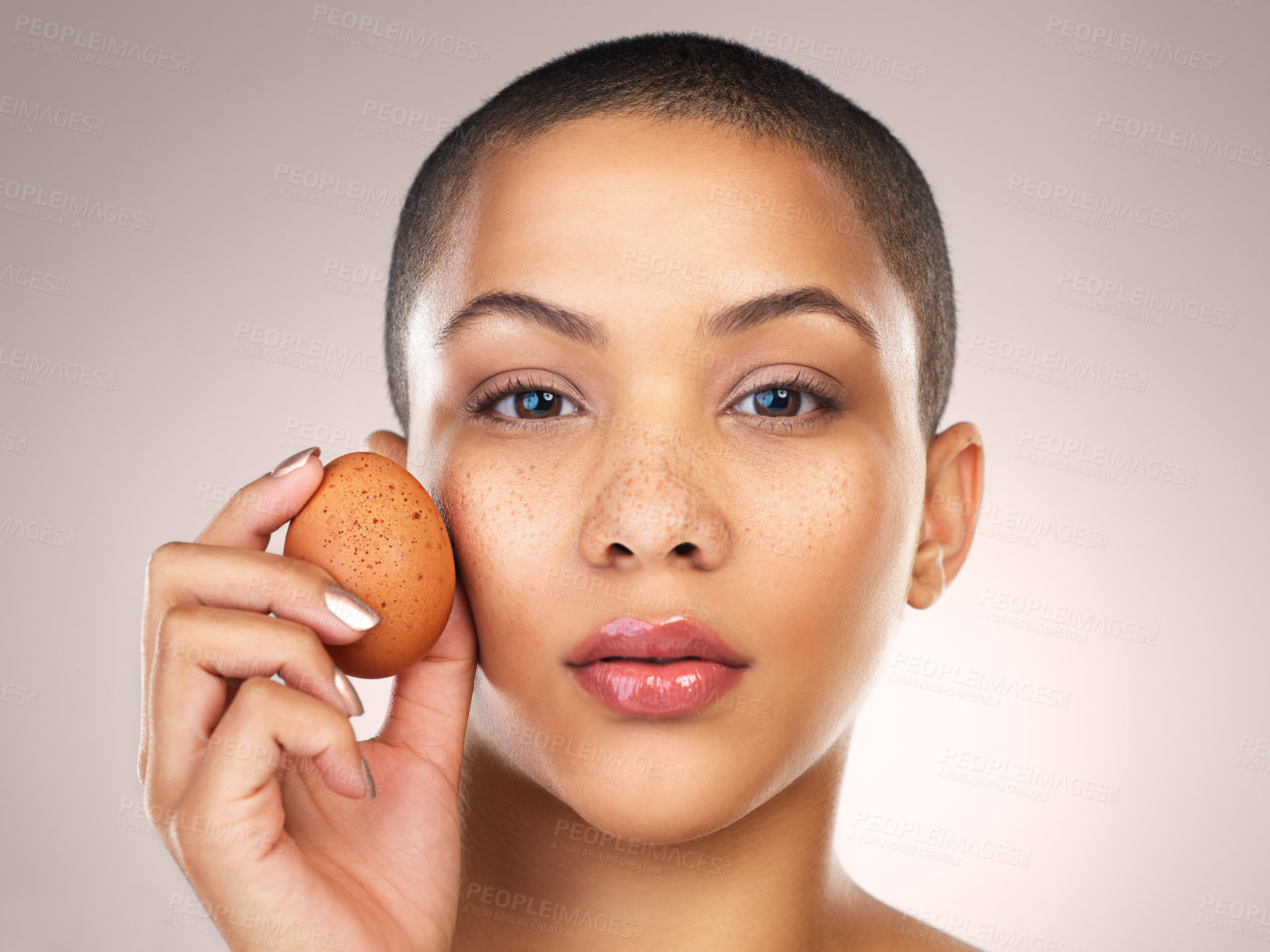 Buy stock photo Egg, beauty and portrait of woman in studio for natural, hydration and facial treatment. Wellness, skincare and female model with poultry for face dermatology routine isolated by gray background.
