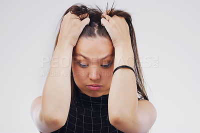 Buy stock photo Stress, upset and woman in studio with mistake, fail or crisis for mental health problem. Worry, emotion and frustrated female person with tension, pressure or burnout for career by gray background.