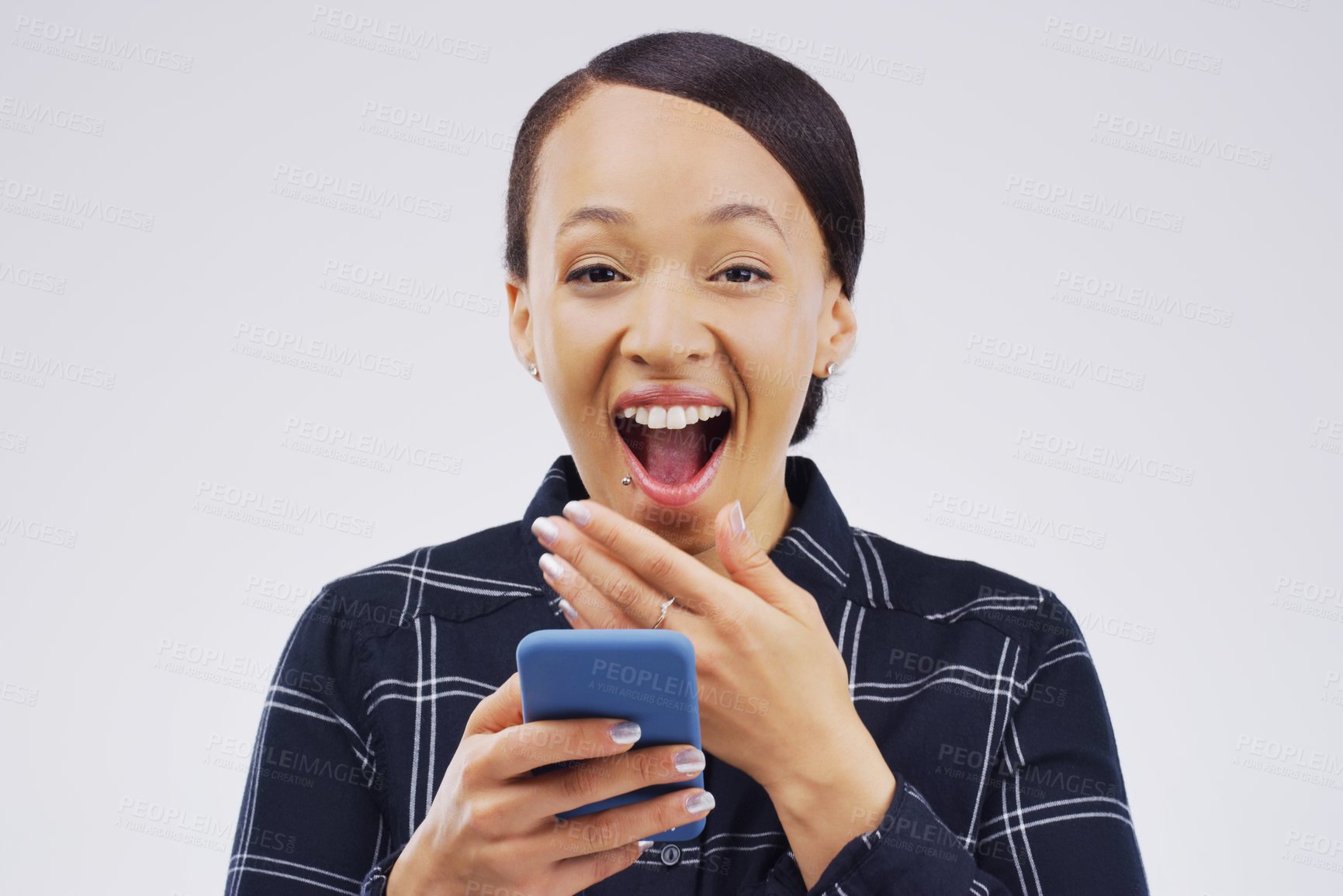 Buy stock photo Woman, portrait and phone surprise for news in studio, victory notification and lottery success. Female person, shock and excited for bonus on gray background, promotion email and discount deal