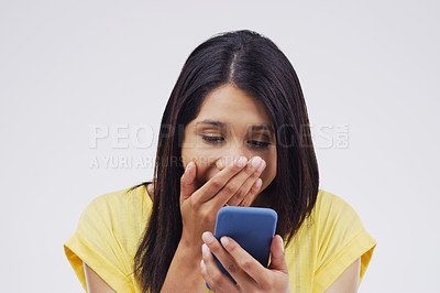 Buy stock photo Woman, surprise and phone for prize, good news or winner against a white studio background. Shocked, surprised or excited female person reading on mobile smartphone for lottery winning, wow or bonus