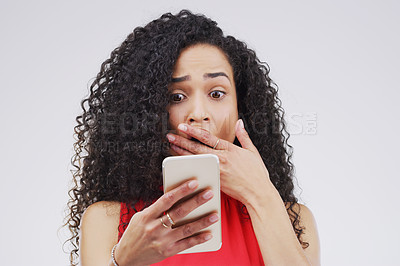 Buy stock photo Woman, surprise and phone on studio background with shock for reading article, social media and omg. Fraud, mobile and person with fear for online scam by grey backdrop for news website and worry