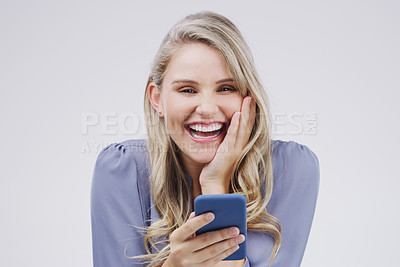 Buy stock photo Businesswoman, portrait and phone for notification in studio, salary increase and lottery success. Female person, investment and offer for bonus on gray background, promotion email and discount deal