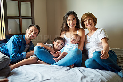 Buy stock photo Portrait of a beautiful family posing together at home