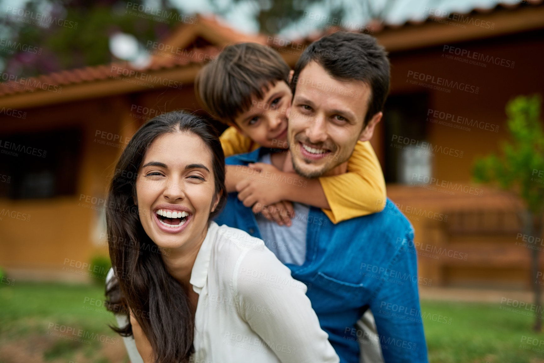 Buy stock photo Portrait, outdoor and family with happiness, funny and bonding with joy, laughing and loving. Face, parents and mother with father, male child or boy outside, house and real estate with weekend break