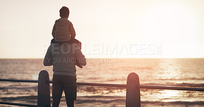 Buy stock photo Father, child and back in sunset at beach for family bonding, playing or fun holiday weekend in nature. Dad carrying kid on piggyback by ocean coast enjoying sunrise or time together on mockup space
