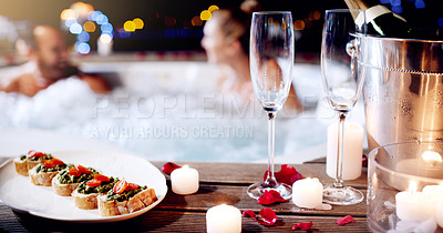 Buy stock photo Love, luxury and champagne with hot tub at spa for holiday, romantic vacation and weekend getaway. Couple, marriage and man and woman in bath with food for honeymoon, anniversary and valentines day