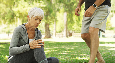 Buy stock photo Old couple, woman with knee pain and injury outdoor, fibromyalgia health problem and joint ache from exercise. Muscle tension, arthritis and people in retirement with fitness in park and emergency