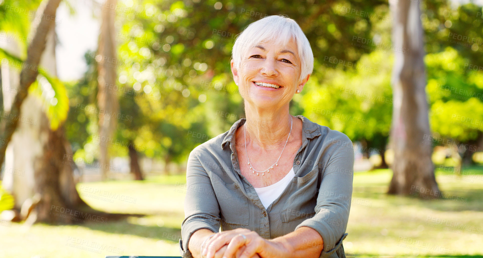 Buy stock photo Elderly woman, portrait and happiness in nature for retirement, relax and smile outside for wellness. Grandmother, unwind and resting in garden for peace, gratitude and nursing home in New York 