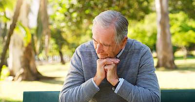 Buy stock photo Depression, thinking and senior man in garden sitting on bench for fresh air in nature. Contemplating, outdoor and worried elderly male person in retirement in park with thoughtful face expression.