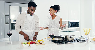 Buy stock photo Couple, kitchen and cooking food together for dinner or supper for date night in home with anniversary. Woman, man and bonding with vegetables or wine in house with love and prepare delicious meal.