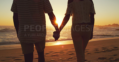 Buy stock photo Couple holding hands, beach at sunset and ocean with back view, vacation and travel with man and woman outdoor. Love, romance and trust with people in commitment, tropical holiday and sea waves