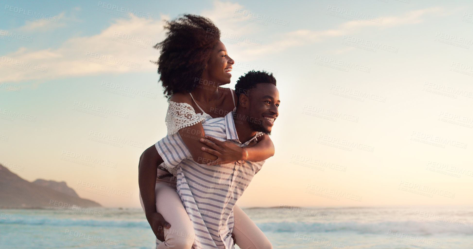 Buy stock photo Black couple, piggyback on beach and travel with hug, love and freedom outdoor, sea view and mockup space. Nature, adventure and vacation, man and woman bonding, happiness and trust in relationship