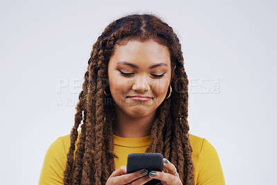 Buy stock photo Phone, typing and face of woman in studio with smile for social media, internet and online chat. Communication, white background and female person on smartphone for website, mobile app and texting