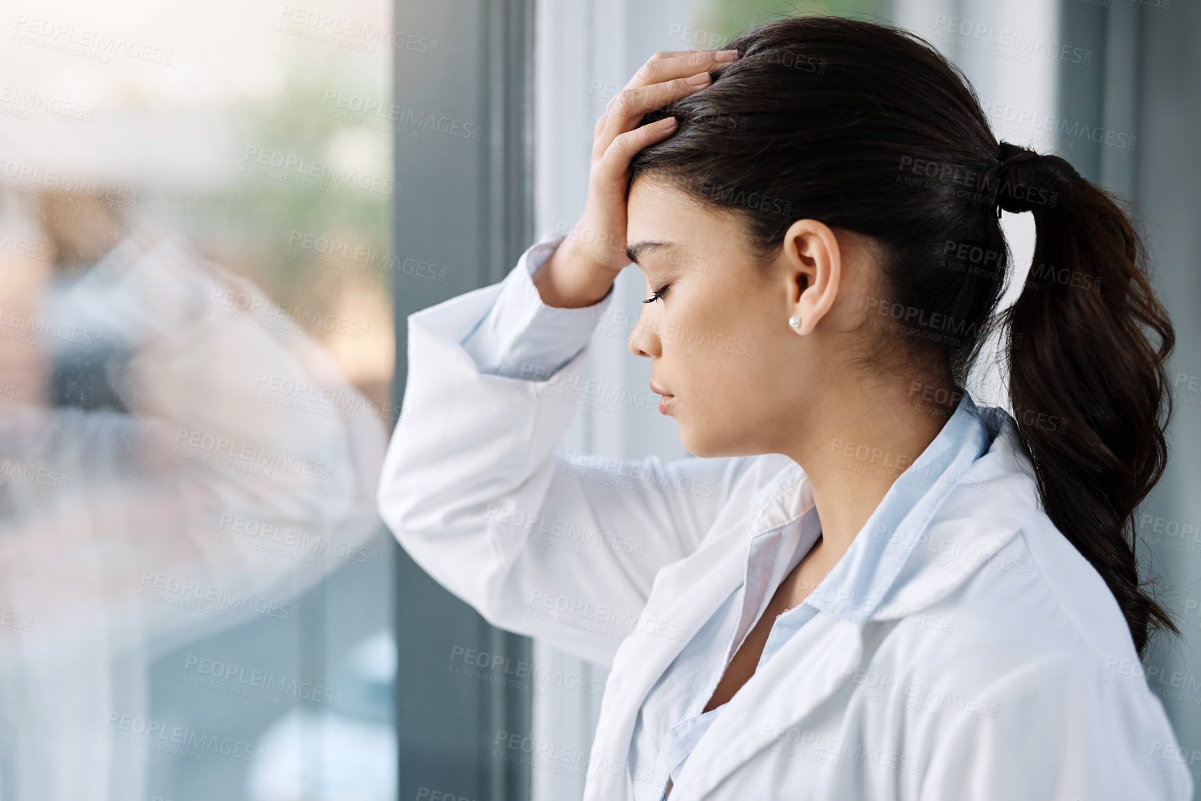 Buy stock photo Stress, sad doctor and woman by hospital window with worry, anxiety and tired with headache in clinic. Healthcare, mental health and stressed female worker with frustrated, depression and burnout