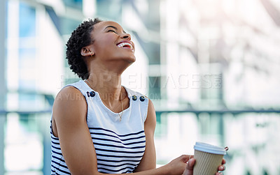 Buy stock photo Cropped shot of an attractive young businesswoman laughing while sitting in a modern workplace