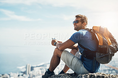 Buy stock photo Man, thinking and view with backpack on rock with thoughts, relax and serenity on adventure for solitude in nature. Person, hiking and cellphone on cliff with mock up, peace and calm sustainability.