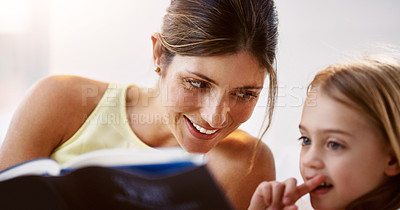 Buy stock photo Children, family and book for education or learning with mother and daughter in home for research. Happy, love or smile with woman parent and girl kid reading story for child development or growth
