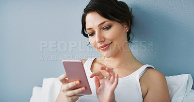 Buy stock photo Typing, smartphone and woman with smile for social media, contact and communication at home on bed to relax. Influencer, happy and lady using phone in bedroom for email, internet and connectivity