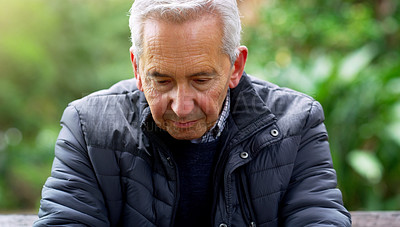 Buy stock photo Thinking, sad and senior man at park for reflection, worry or plan future in nature. Depression, retirement and person at garden outdoor for decision, doubt and stress with anxiety for mental health