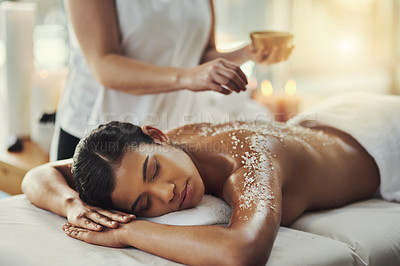 Buy stock photo Woman, sleeping and relax in salt scrub massage at spa for skincare, exfoliation or body treatment. Calm female asleep or resting in relaxation for back therapy, health or zen with masseuse at salon