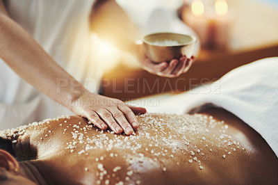 Buy stock photo Woman, hands and relax in salt scrub for skincare, exfoliation or relaxation at indoor beauty spa. Hand of masseuse rubbing salts on female back for physical therapy, massage or treatment at resort