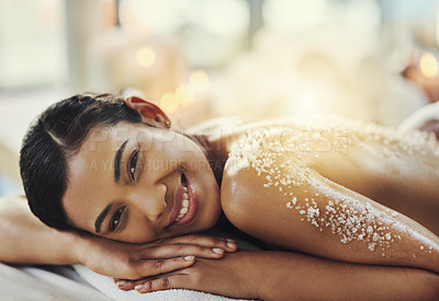 Buy stock photo Happy woman, back or portrait at spa in salt scrub for cosmetics treatment, skincare and massage at resort. Face of female person relax on bed for exfoliation, beauty therapy and wellness at salon