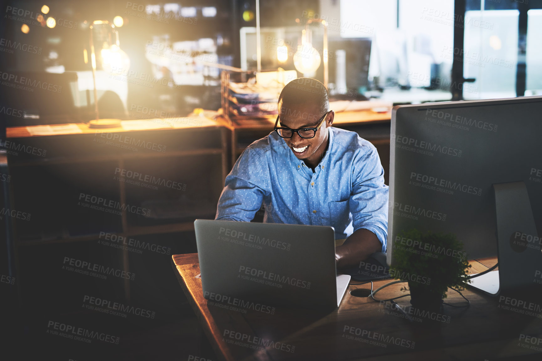 Buy stock photo African, businessman and happy on tech for research at night as corporate communication specialist. Male person, working late and laptop for connection, internet and company as professional in office