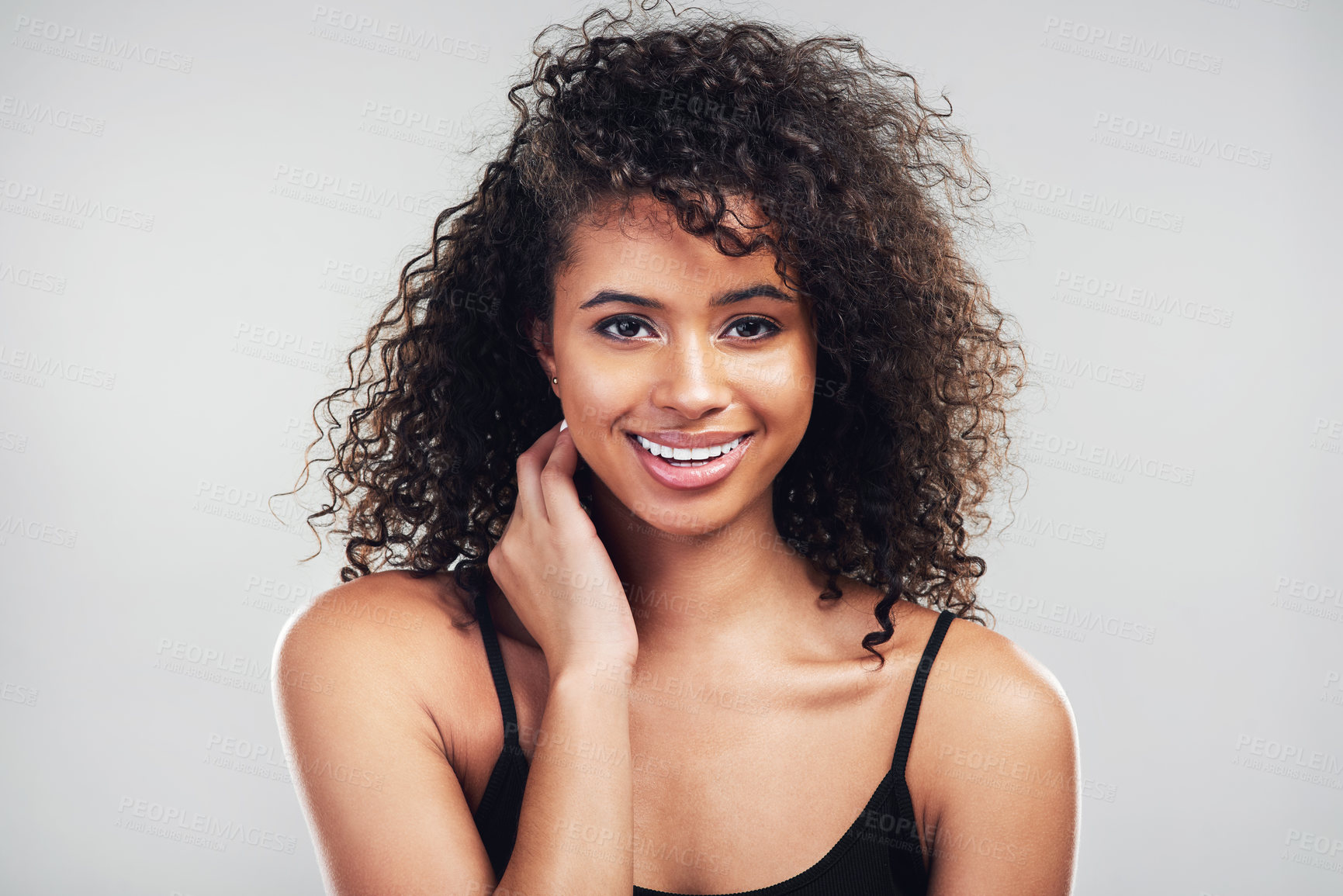 Buy stock photo Portrait, woman and beauty in studio for skincare, natural and cosmetic on white background. Curly hair, cosmetology and facial treatment with collagen for model person, hands or texture for haircare