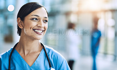 Buy stock photo Cropped shot of a female nurse standing in a hospital