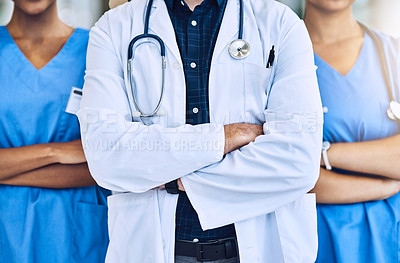 Buy stock photo Cropped shot of three medical practitioners standing together