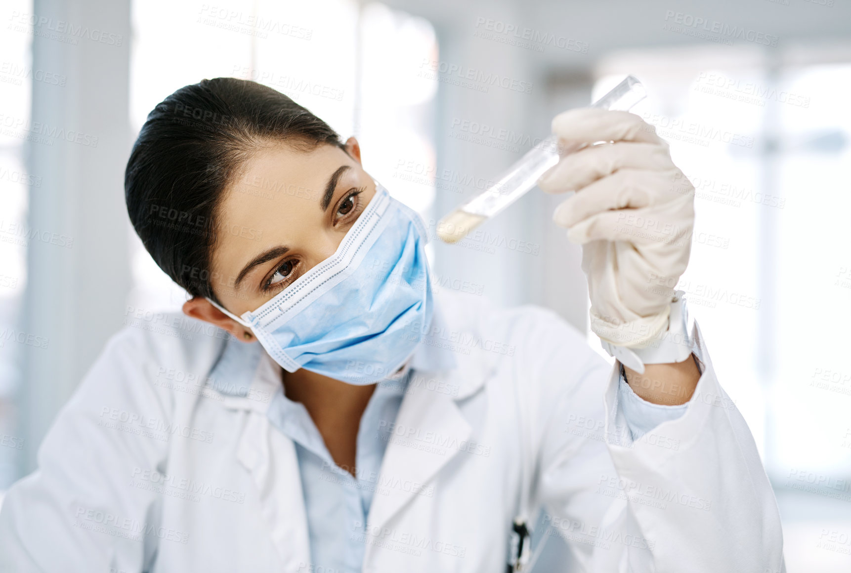 Buy stock photo Lab, mask and woman scientist with test tube, solution or pharmaceutical vaccine development. Healthcare innovation, science and person checking medical drugs for research, process or study in clinic