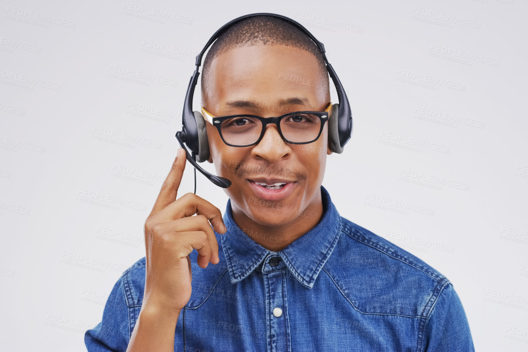 Buy stock photo African man, portrait and studio with headphones for customer service or call center, smile for communication. Male person, white background and microphone with happiness for chat or telemarketing