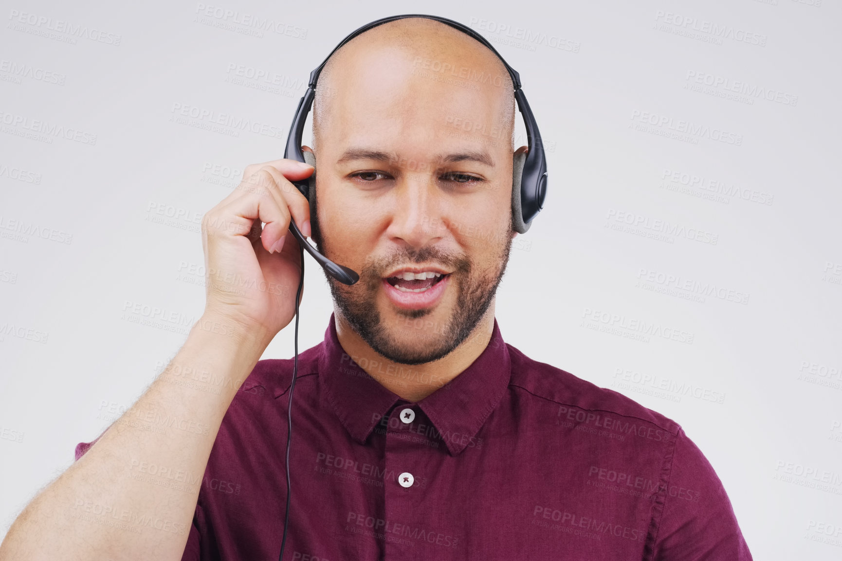 Buy stock photo Man, thinking and studio with headphones for customer service or call center, smile for communication. Male person, white background and microphone with happiness for chat, telemarketing or working