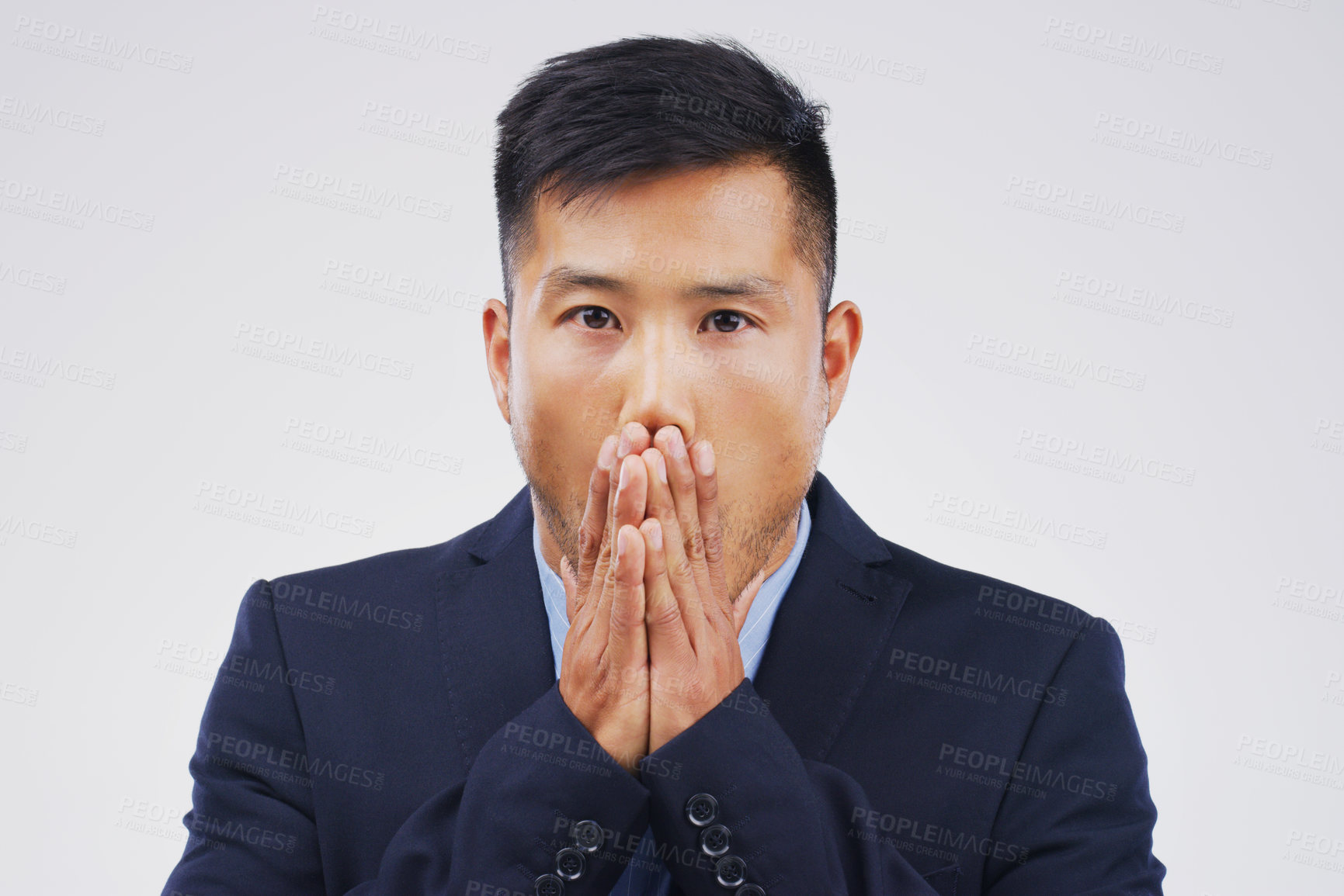 Buy stock photo Studio shot of a young man looking shocked against a grey background