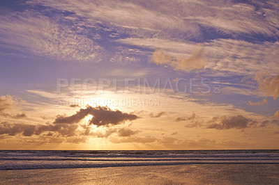 Buy stock photo Nature, sky and wallpaper with sunset on beach for holiday, travel or vacation to island paradise. Background, clouds and waves on coast of tropical environment for summer or weekend getaway