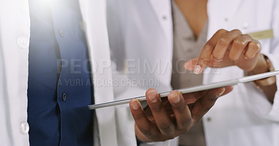 Buy stock photo Pharmacist, hands and tablet with research for medical study, healthcare or discussion at pharmacy. Closeup of employees on technology for telehealth, inventory or checking online stock at dispensary