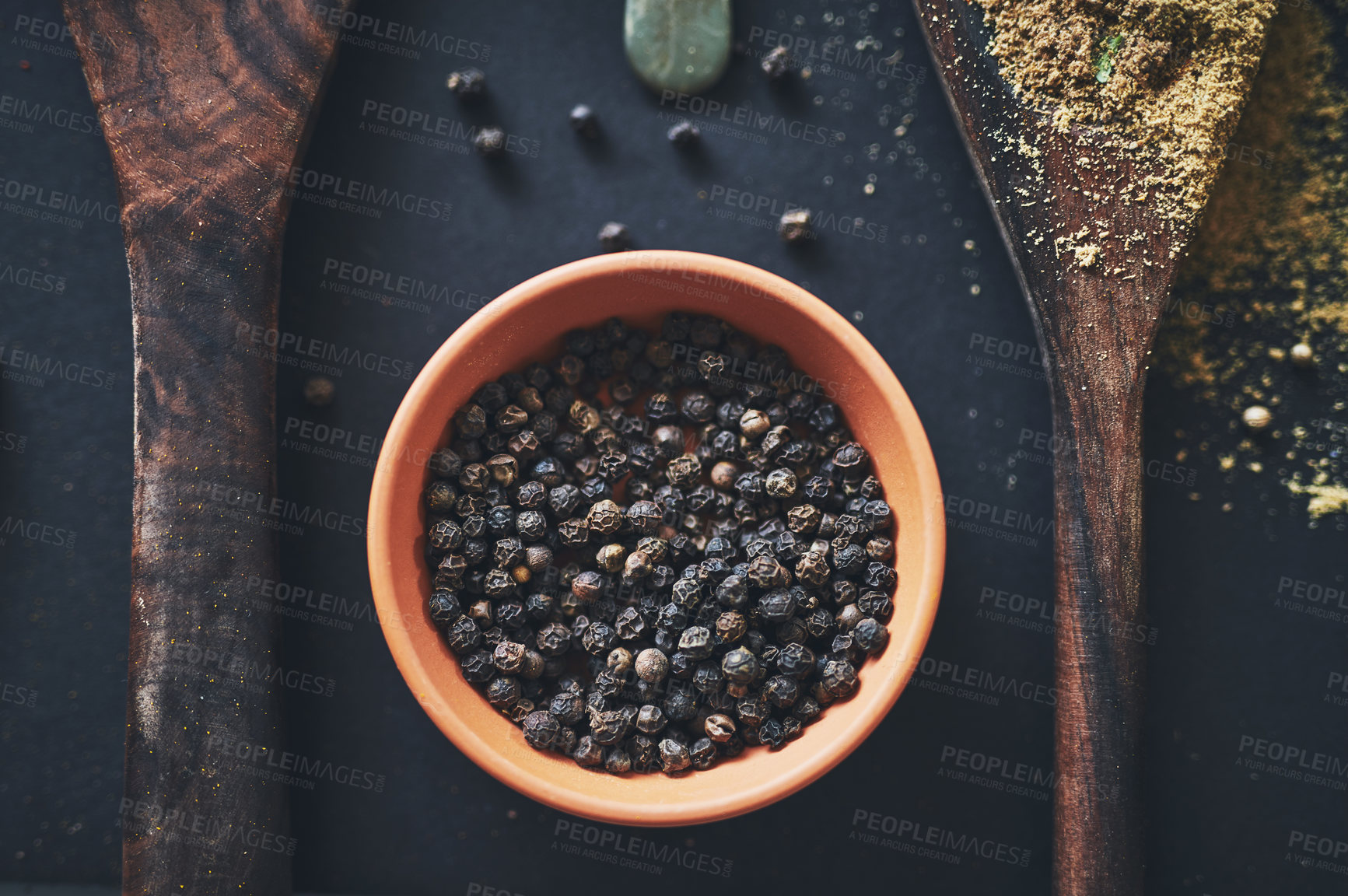 Buy stock photo Peppercorn, kitchen and spices in bowl on background for healthy, natural and organic food. Table, top view and black pepper above for seasoning herbs, condiments and cooking powder with ingredients