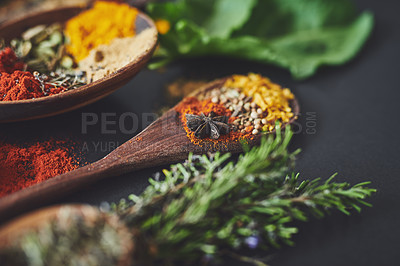 Buy stock photo Kitchen, spices and ingredients on table for culinary art, flavor and closeup with leaves for cooking. Seeds, curry and above counter with spoon for meal prep, herbs or variety for food at restaurant