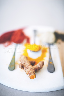 Buy stock photo Board, spices and ginger on table with spoon, seasoning and ingredients for meal with powder. Fresh, collection and condiment with flavor for cooking, turmeric and paprika in Indian culture for aroma