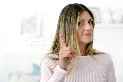 Buy stock photo Cropped shot of an attractive woman posing at home