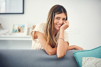 Buy stock photo Cropped shot of an attractive woman spending the day at home