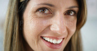 Buy stock photo Cropped shot of an attractive woman smiling at the camera