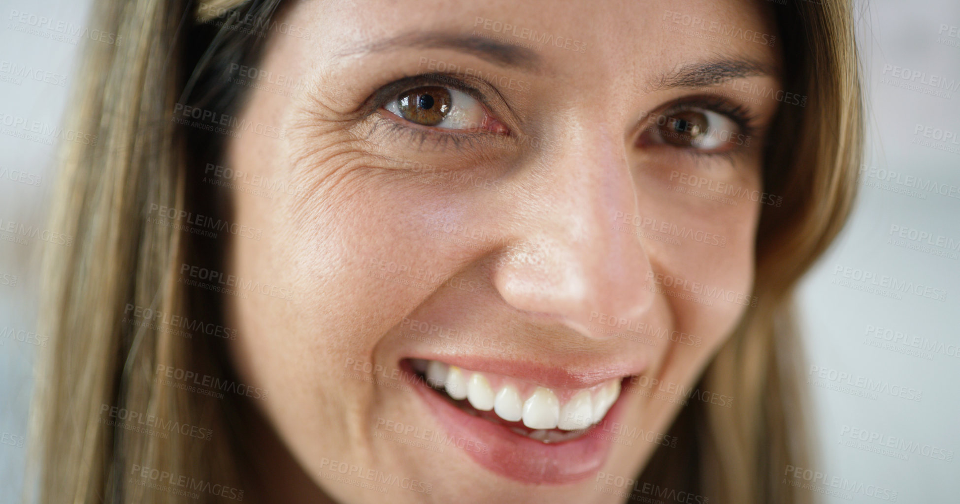 Buy stock photo Cropped shot of an attractive woman smiling at the camera