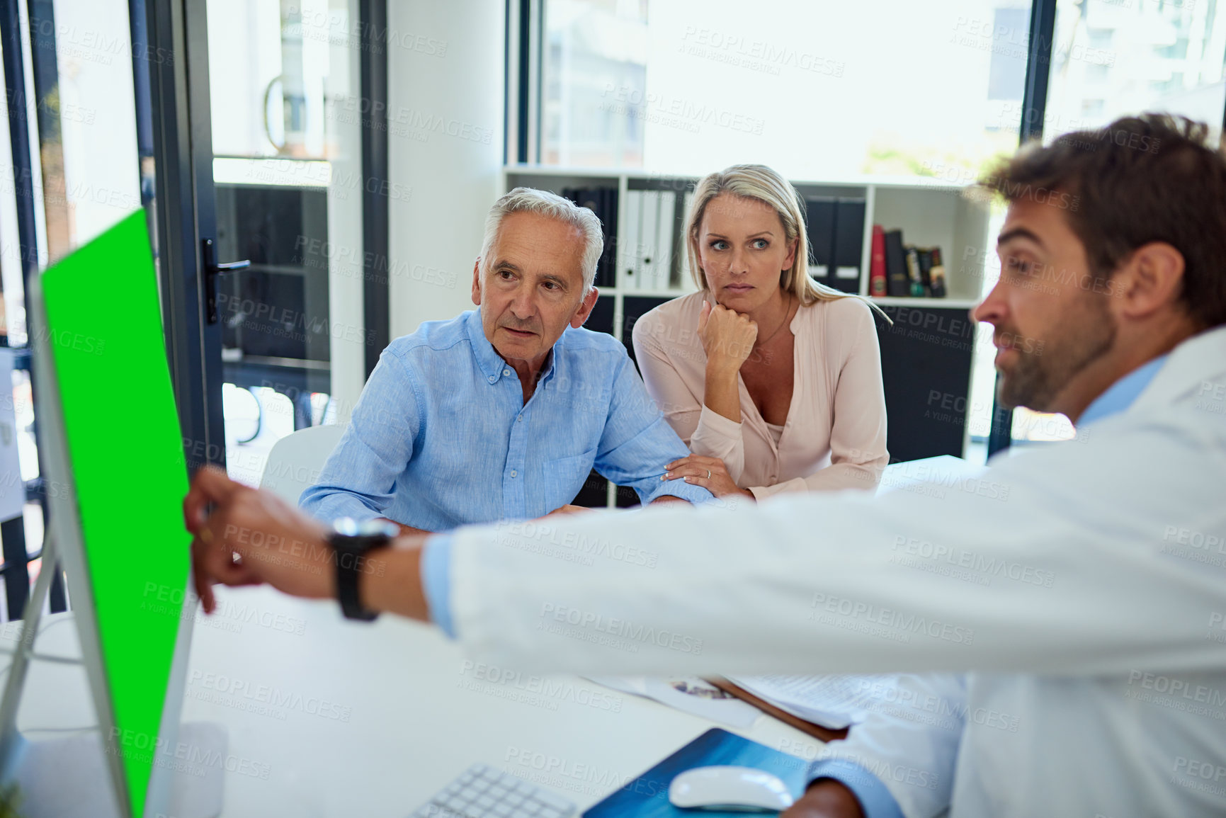 Buy stock photo Doctor, patient or computer green screen in clinic for test results, digital xray or stress for healthcare report. Senior father, woman or surgeon pointing to chroma key display for medical diagnosis