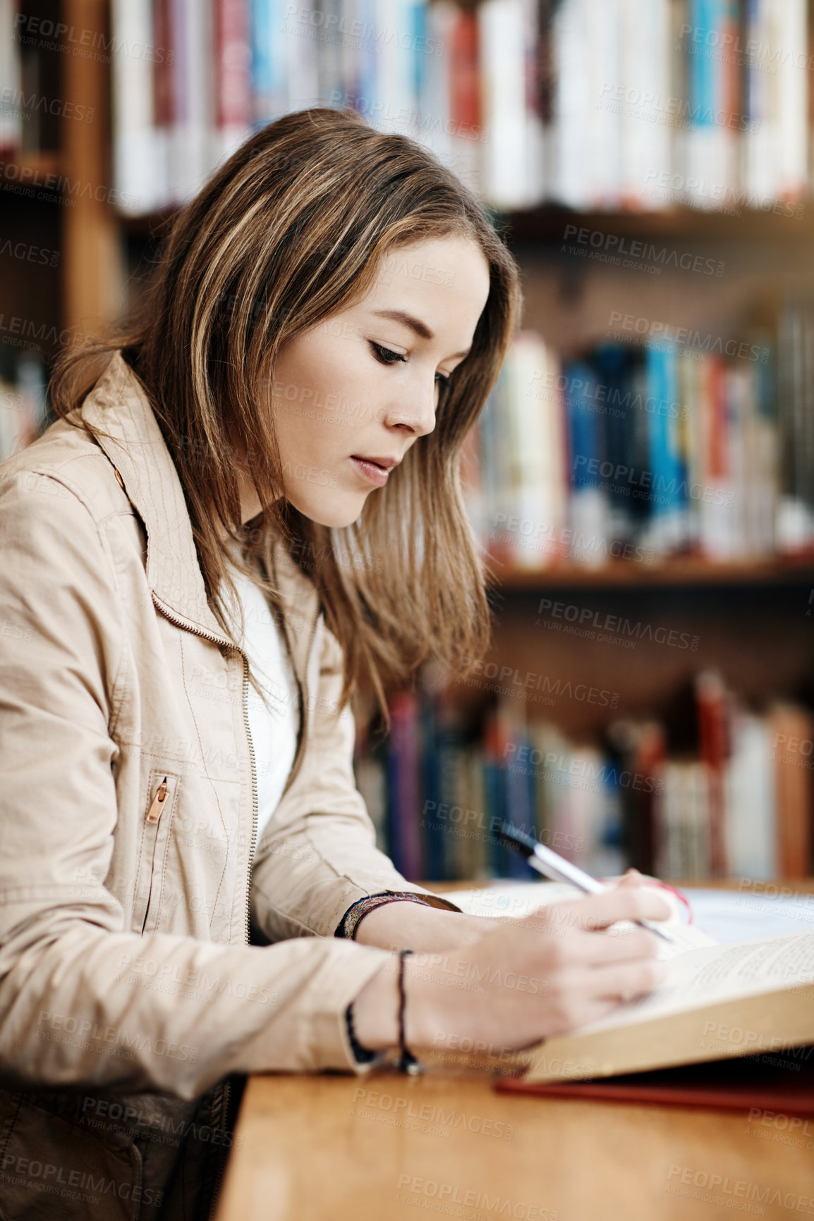 Buy stock photo College student, research and woman learning at library for education, knowledge or test preparation. University, girl and studying with book for help, project notes and reading scholarship report