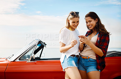 Buy stock photo Directions, road trip and women with mobile by car for social media post, location or information. Outdoor, talking and female friends with smartphone for adventure, holiday or explore in Florida