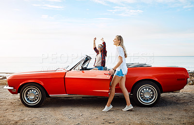 Buy stock photo Friends, woman and travel in car with freedom, scenery and fun adventure by ocean with mockup space. Road trip, people and convertible vehicle on coast at beach for sightseeing, journey and bonding