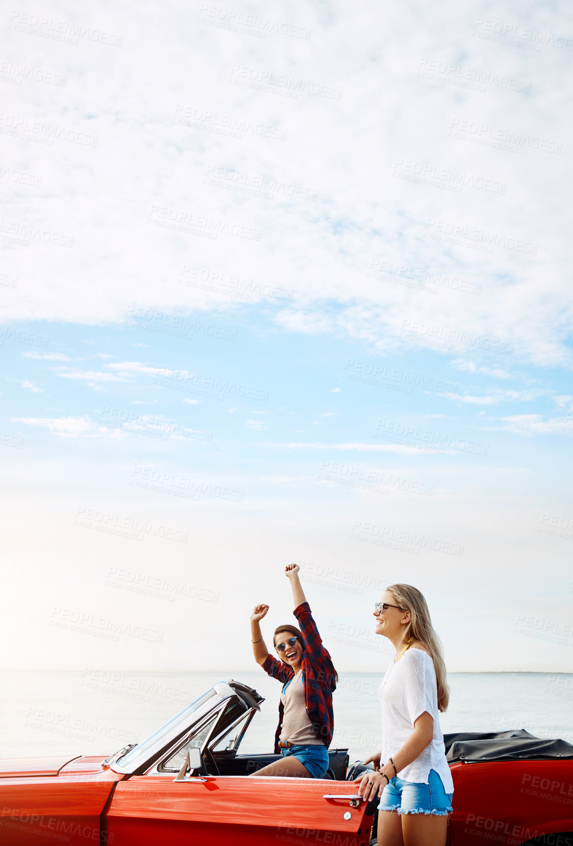 Buy stock photo Friends, woman and freedom in car at beach with travel, scenery and fun adventure with mockup space. Road trip, people and convertible vehicle on coast at ocean for sightseeing, journey and bonding