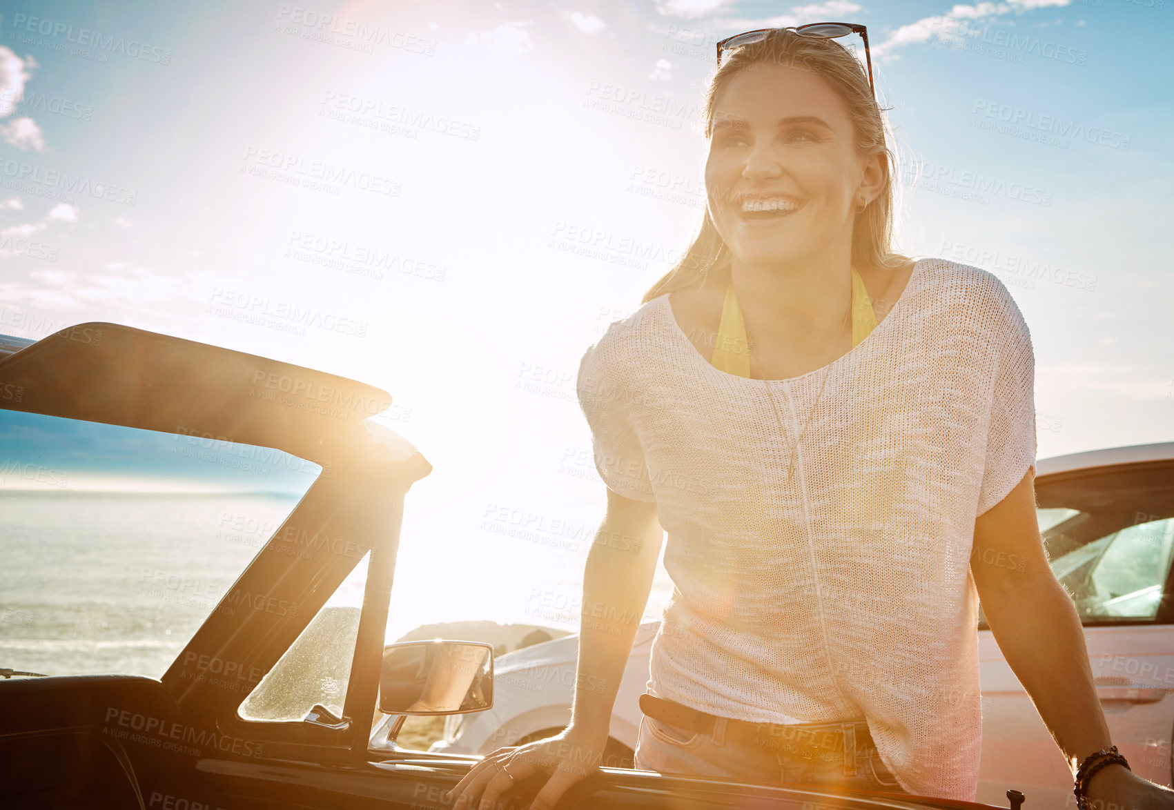 Buy stock photo Sunset, road trip and woman with travel for holiday, journey or vacation by beach. Happy, nature and female person with by car for self discovery adventure at weekend destination in California.